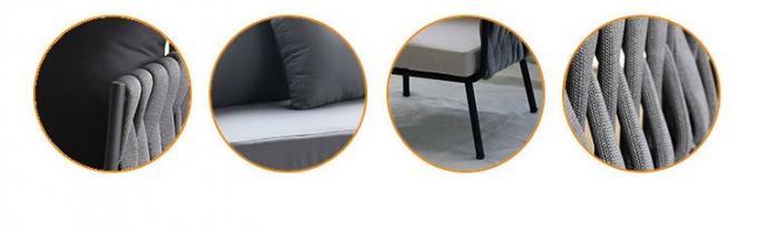 Insieme di vimini beige del sofà della Tabella del cortile e dei mobili da giardino all'aperto della sedia